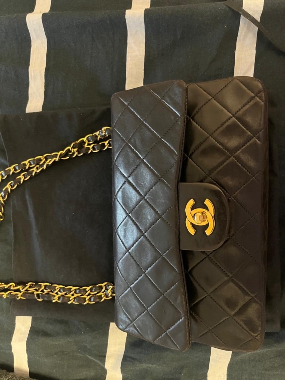 Small CHANEL Black Quilted Double Flap 
 Gold Hardware.